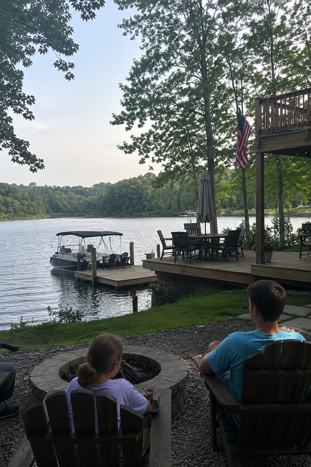 Family Enjoying a Waterfront Vacation Rental in Athens, Alabama - VLB Properties LLC - VLB Properties LLC Family relaxing beside the waterfront at a lake house vacation rental in Athens, Alabama with a private dock and peaceful lake views